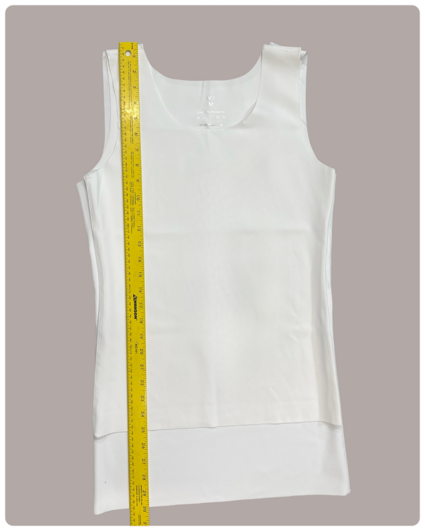 Memory Bind, Longer length/ tall Full compression tank. Smooth abs and gynecomastia